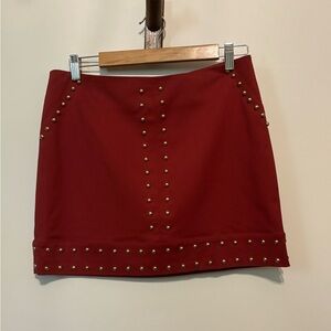 Dark red Gianni Bini gold studded mini skirt